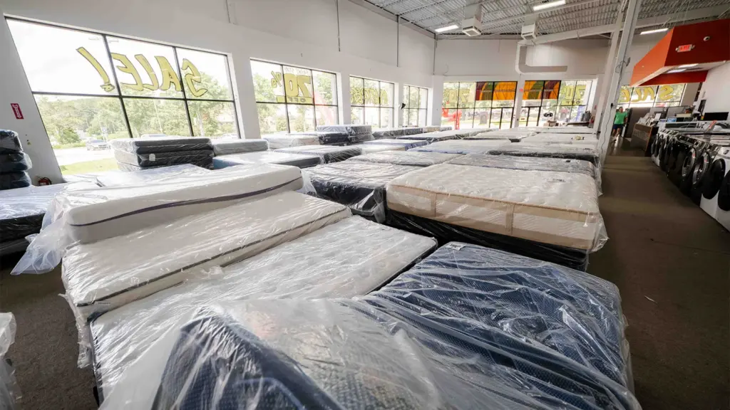 Discount mattresses on display at Compare Deals mattress outlet
