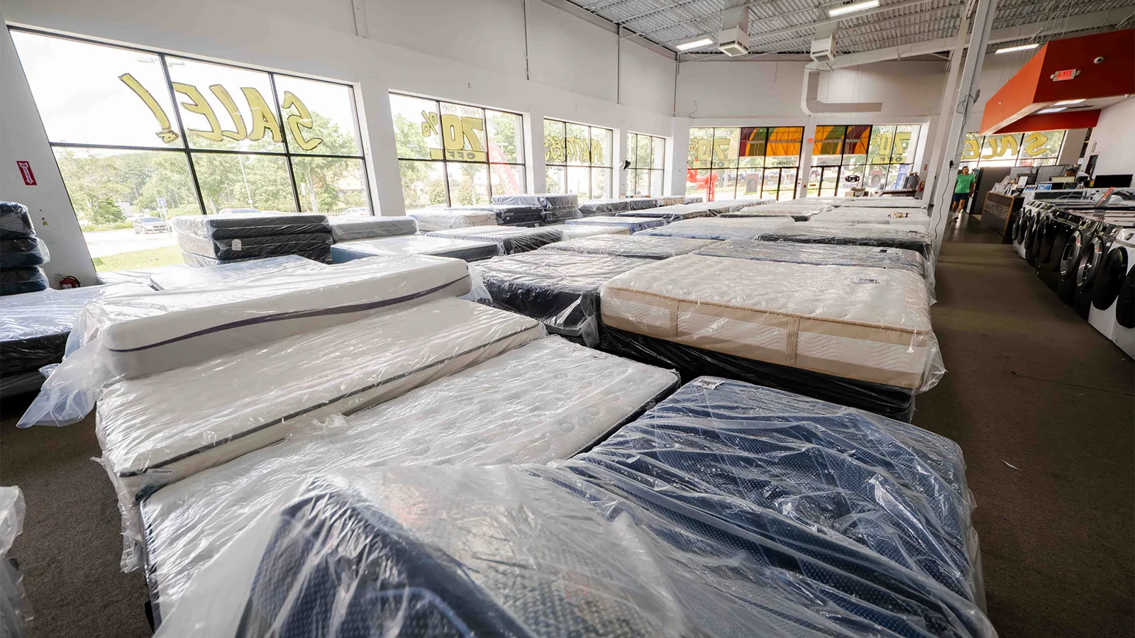 Discount mattresses on display at Compare Deals mattress outlet